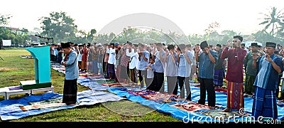 Implementation of Eid al-Fitr 1444H prayers in the Green field Editorial Stock Photo