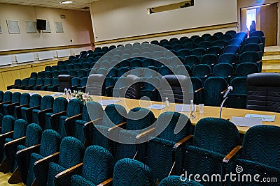 The imposition of the assessments to the participants of the business conference. Jury table at the sports event. A place for Stock Photo