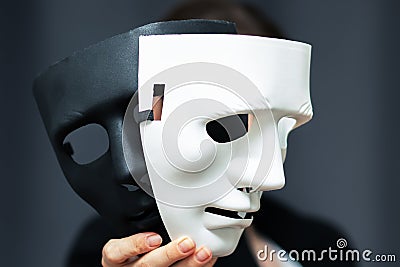 Impostor mask, spy, falsification of documents, illegal actions, identification of fake personalities, data protection from theft Stock Photo