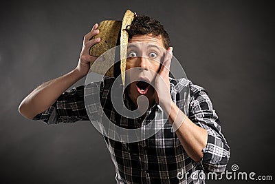 Impressed Man with hat Stock Photo