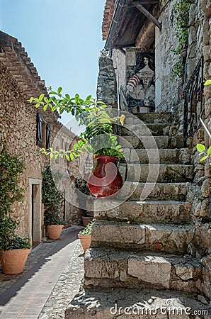 Impression of the narrow streets in the old center of the picturesque medieval French village of Eze Editorial Stock Photo