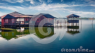 Impressiv morning view of fishing dock on popular tourist attraction Patocut Laguna. Stock Photo