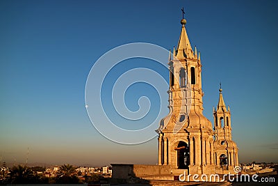 Impressive bell tower of Basilica Cathedral of Arequipa with the morning moon Stock Photo