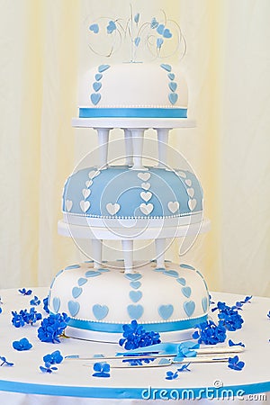 Impressive Blue and White 3 Tier Wedding Cake Stock Photo