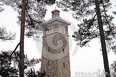 The impressive carolinen tower on the mountain KÃ¶tsch near to Blankenhain in Thuringia. The viewing tower is 26m high Stock Photo