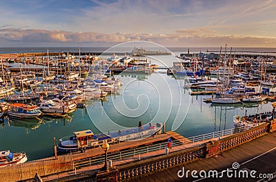 The impressive entrance to the historic Royal Harbour of Ramsgate, Kent, Uk, full of leisure and fishing boats of all sizes Stock Photo