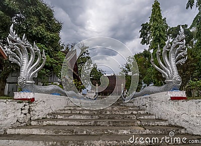 The impressive entrance to the Vat Phramahathat Rajbovoravihane temple in Luang Prabang, Laos Stock Photo