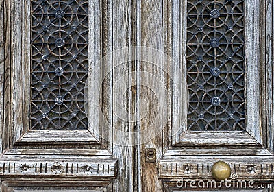 Impressive entrance, wooden weathered brown door, classical architecture building detail Stock Photo