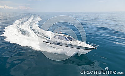 Motorboat sailing in the sea Stock Photo