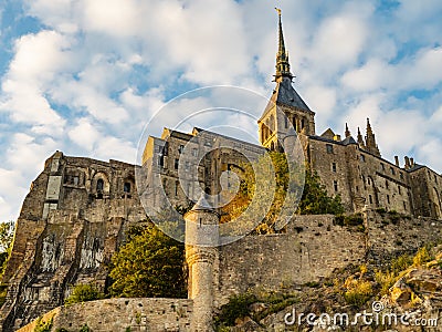 Le Mont Saint Michel at sunset, Normandy, Northern France Stock Photo