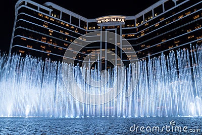 Wynn palace macau, nightitme fountain, water feature with large water jets Editorial Stock Photo