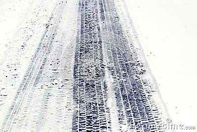 Imprint of a car tire on wet snow Stock Photo