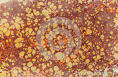 Imprint ebru texture on paper brown yellow Stock Photo