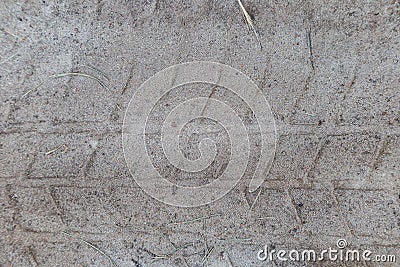 Imprint trail of tread on sand, truck tires, tractor, agricultural machinery, road sand, protector rubber, old tires Stock Photo