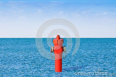 An improbable hydrant at the seaside. Plenty of water concept image Stock Photo