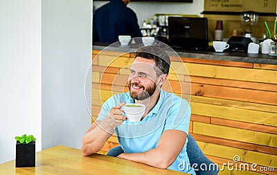 Improve overall health. Take moment to care about yourself. Coffee drinkers live longer. Man bearded guy drinks Stock Photo