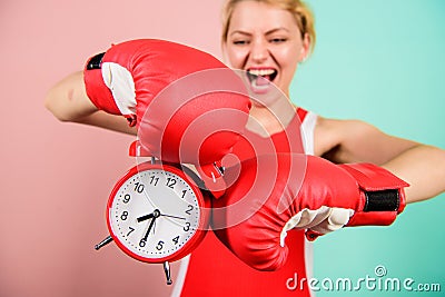 Improve yourself. Overcome harmful habits. Time for training. Get used to personal regime. Girl athlete boxing gloves Stock Photo