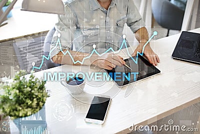 Improvement graph on virtual screen. Business and technology concept. Stock Photo