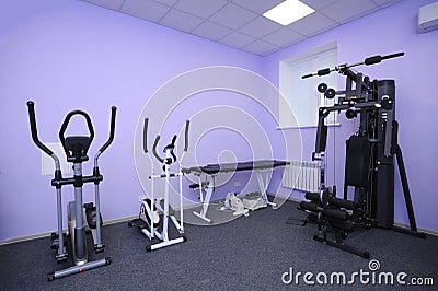 Improving motor control. Exersice machines set in a gym of Municipal Department of rehabilitation for disabled people Editorial Stock Photo