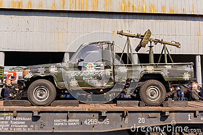 Improvised gun truck of terrorists on a railway flatcar Editorial Stock Photo