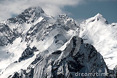 Inaccessible snow-capped peaks closeup Stock Photo
