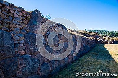 Inca Wall in SAQSAYWAMAN, Peru, South America. Example of polygonal masonry. The famous 32 angles stone Stock Photo