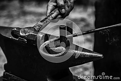 Incandescent iron in an old metal forge Stock Photo