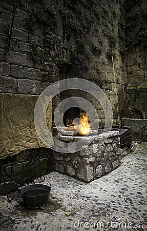 Incandescent iron in an old metal forge Stock Photo