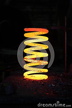 Incandescent iron spring from some heavy wehical Stock Photo