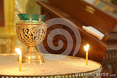 Incense burner and candles. church, bari, italy. faith Stock Photo