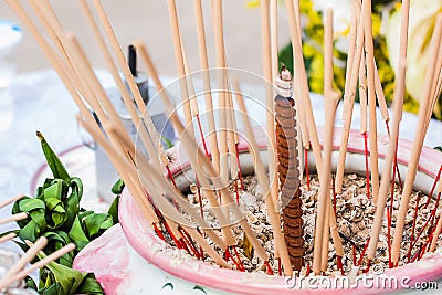 Incense burner with embroidery for altar incense in religious holidays such as merit, ordain, funeral. Stock Photo