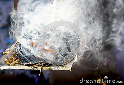 Incense of herb stick smokes as Shamanic tradition Stock Photo