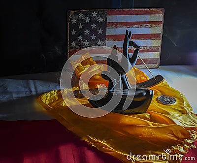 Incense on orange cloth and a collection coin of the 12 apostles Stock Photo