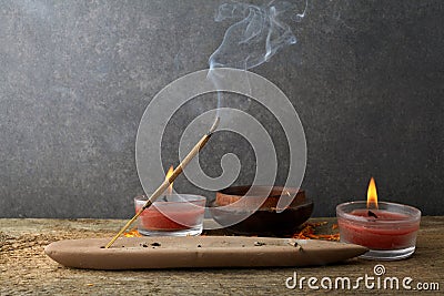 Incense stick and smoke from incense burning. Beautiful smoke. Aromatherapy Stock Photo
