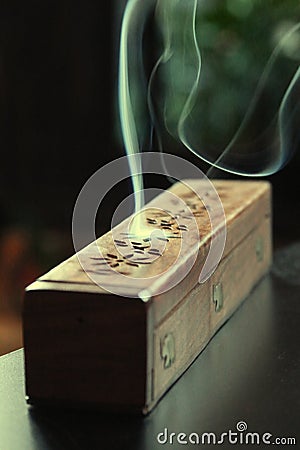 Incense stick smoking Stock Photo