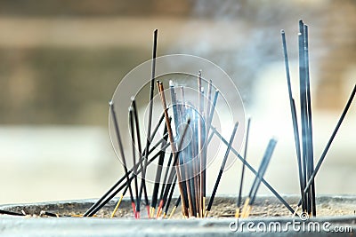 Incense sticks fire background Stock Photo