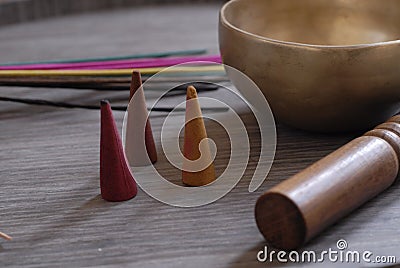 Incense sticks and three incense cones multicolored Stock Photo