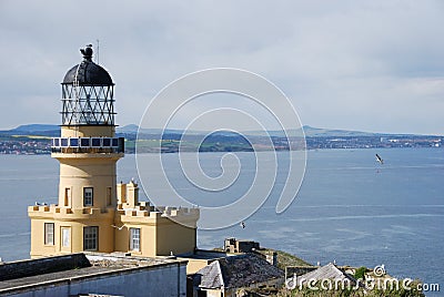 Inchkeith Lighthouse and Lomond Hills Stock Photo
