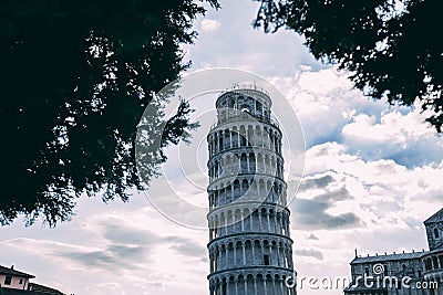 INCLINE Pisa tower from many different perspectives, duomo, blue sky with clouds, sun flare, wide angle photo, bottom and side vie Stock Photo