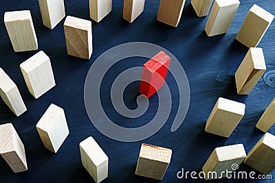 Inclusion, diversity and discrimination. Red block in the circle from wooden ones Stock Photo