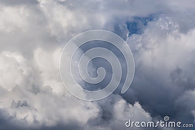 Incoming storm close-up cloudscape at march daylight in continental europe. Captured with 200 mm telephoto lens Stock Photo