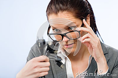 Incompetent businesswoman in geek glasses Stock Photo