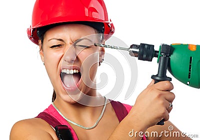 Incompetent female worker with drill Stock Photo