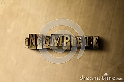 INCOMPLETE - close-up of grungy vintage typeset word on metal backdrop Cartoon Illustration