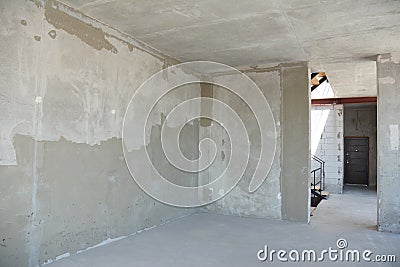 Incomplete plastering house room renovation and remodeling with doorway Stock Photo