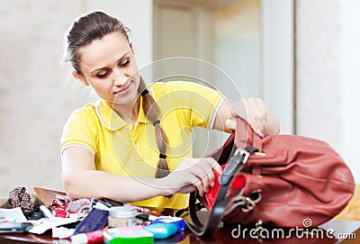 Inconsiderate woman lost something Stock Photo