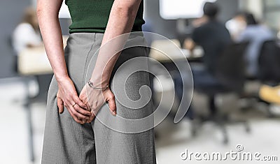 Incontinence woman cannot reach the toilet, suffers from stomachache, urinary incontinence Stock Photo