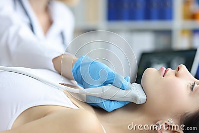 Increase in submandibular lymph nodes and doctor conducts ultrasound Stock Photo