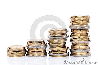 Increasing stacks of coins Stock Photo