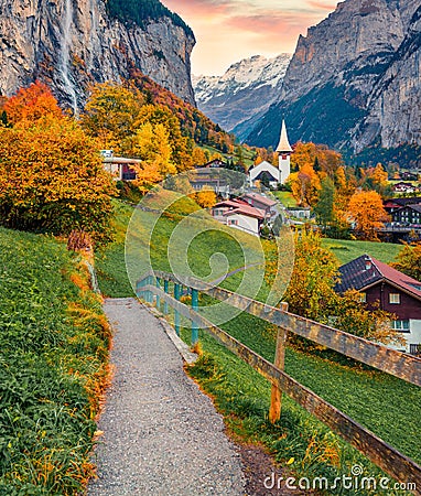 Incredible autumn view of great waterfall in Lauterbrunnen village Stock Photo